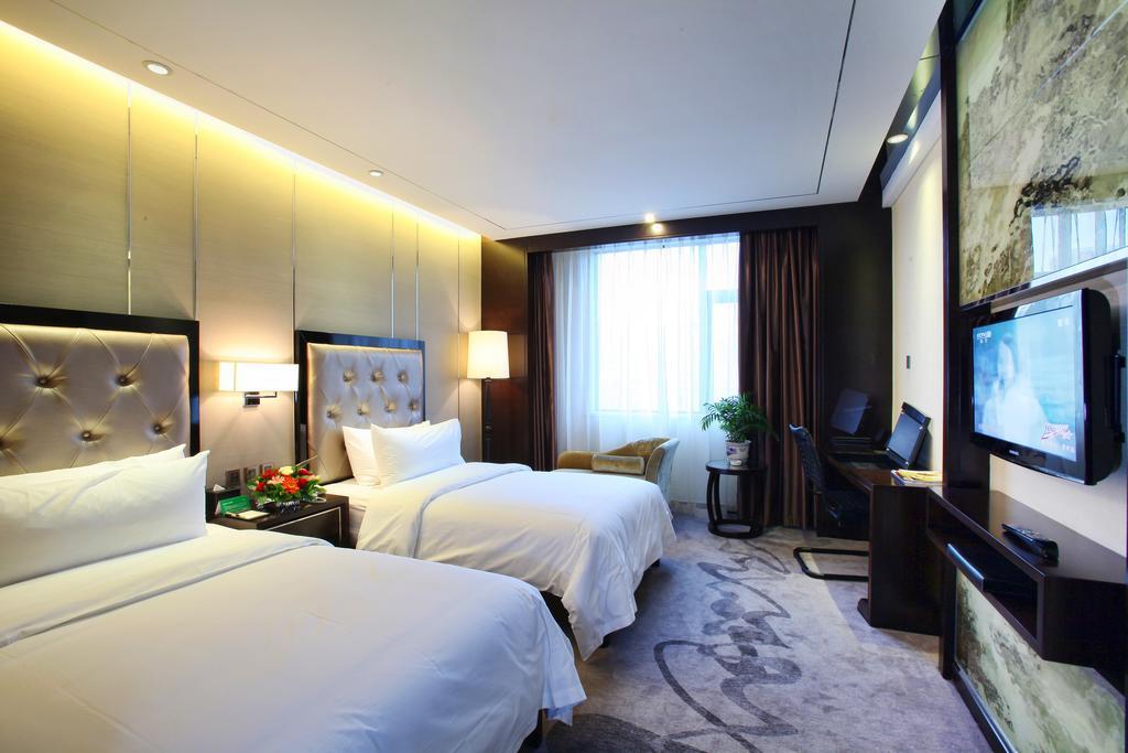 Xichang Minshan Hotel Rum bild