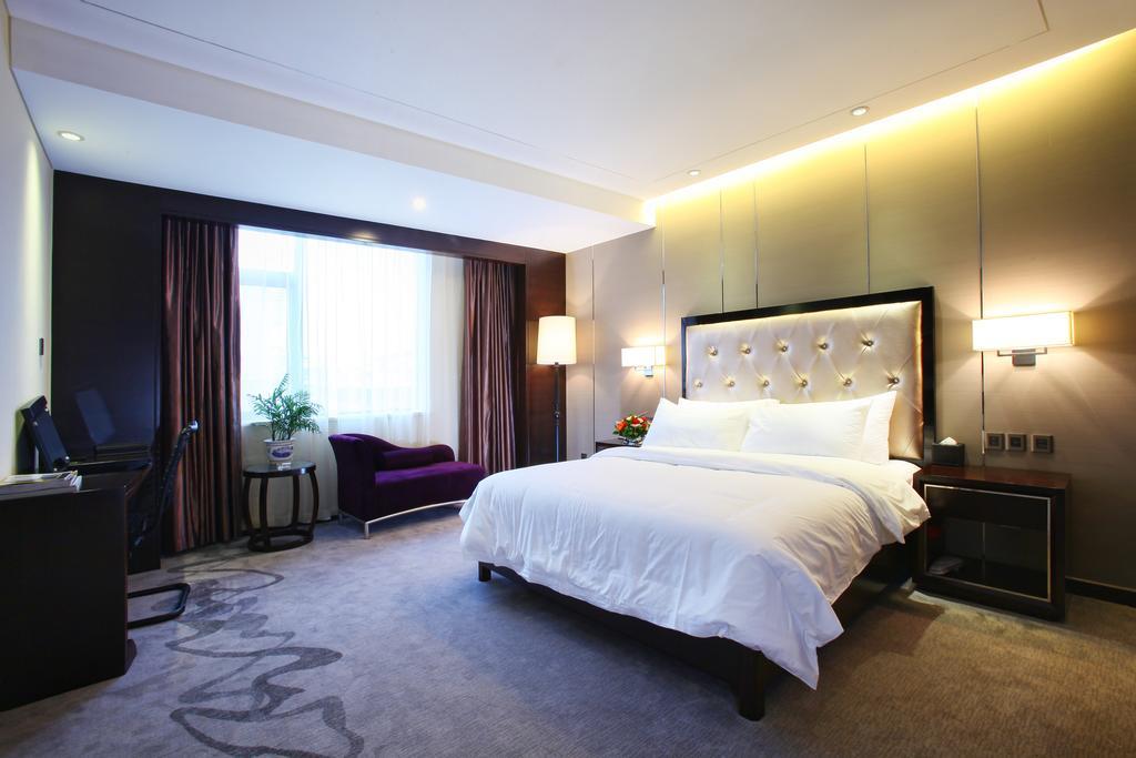 Xichang Minshan Hotel Rum bild